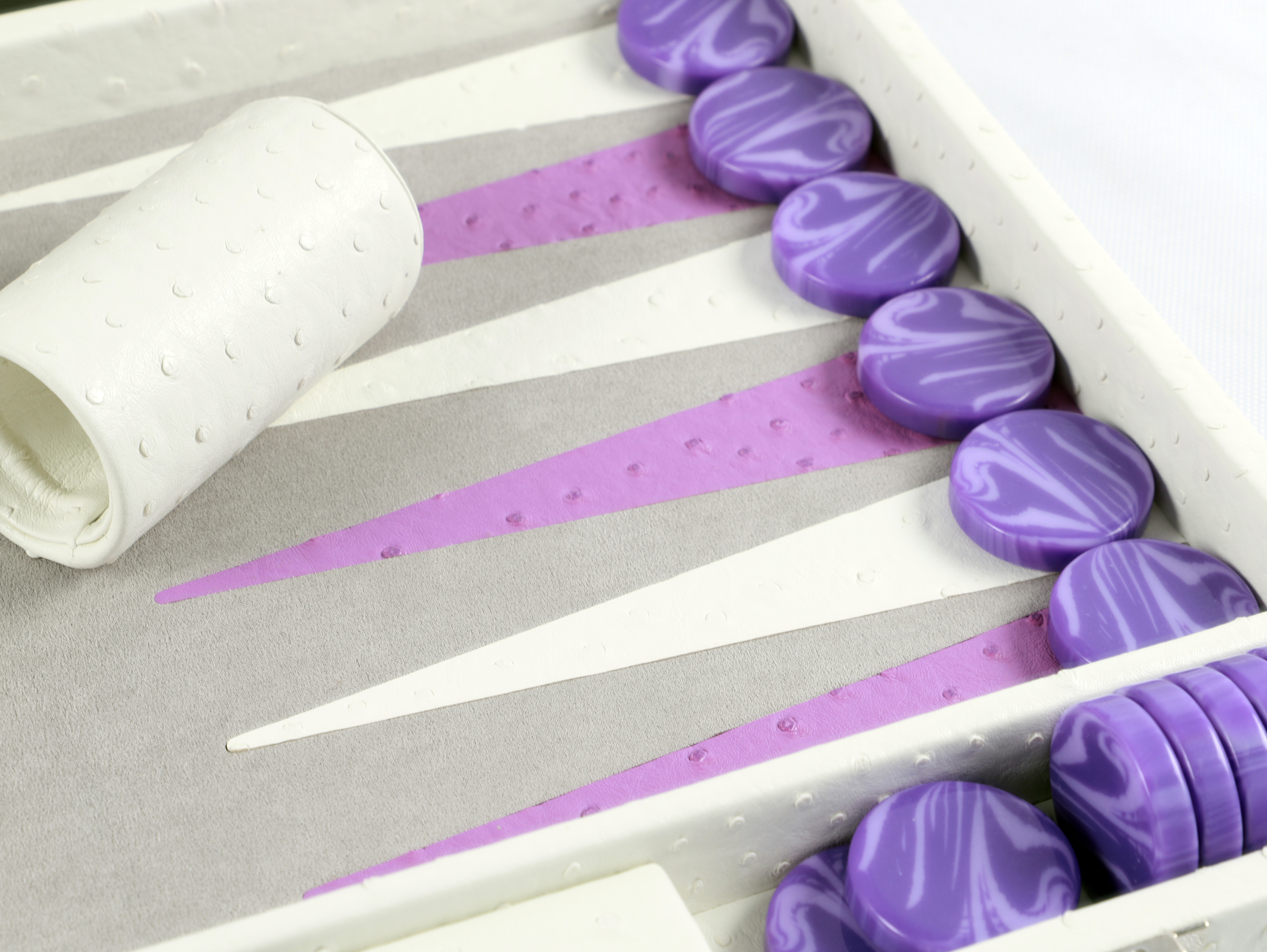 2025 newly designed backgammon board draws inspiration from the creamy hue of ostrich-patterned vegan leather.