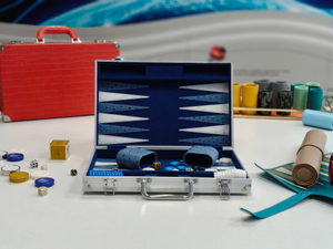 Portable aluminum frame backgammon set with folding board and smooth playing surface