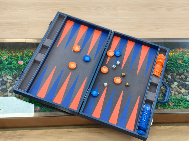 modern blue leather backgammon set with orange and navy playing field OEM supplier