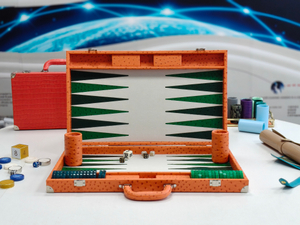 orange ostrich texture backgammon suitcase closed luxury board game